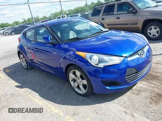 2012 Hyundai Veloster w/Gray Int z VIN KMHTC6AD3CU074501, wystawiony jako IAAI lot #42289456 z przebiegiem 94 303 mil mil oraz . Historia ofert i sprzedaży dostępna na DreamBid. Obrazek 1.
