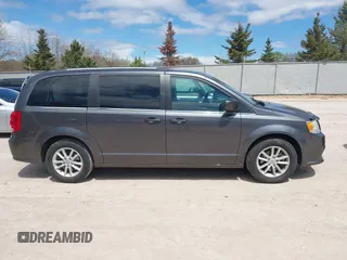 2018 Dodge Grand Caravan SXT z VIN 2C4RDGCG8JR129835, wystawiony jako IAAI lot #42190326 z przebiegiem 81 818 mil mil oraz . Historia ofert i sprzedaży dostępna na DreamBid. Obrazek 13.