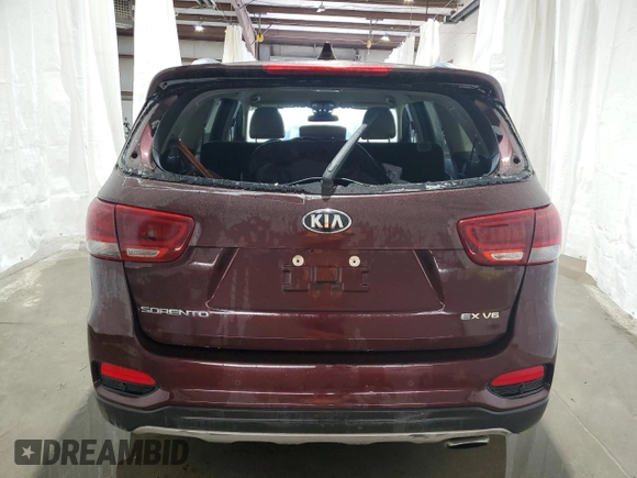 2019 Kia Sorento EX with VIN 5XYPH4A54KG464334, listed as a Copart auction lot 70758104 with 63,938 mi miles and Salvage Title. Bid and sale history available at DreamBid. Image 6.