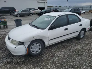 1998 Mazda Protege DX with VIN JM1BC1415W0202950, listed as a Copart auction lot 71992944 with 98,689 mi miles and Salvage Title. Bid and sale history available at DreamBid. Image 1.