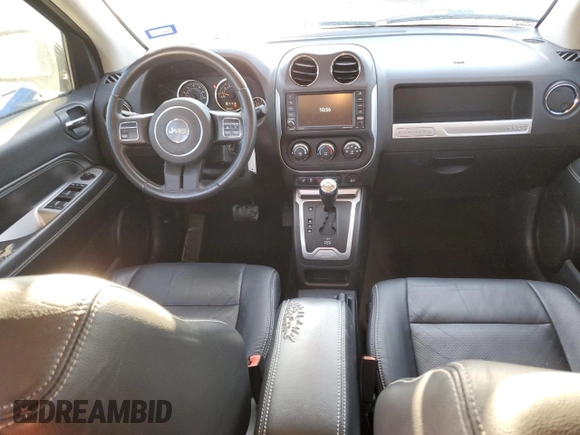 2014 Jeep Compass High Altitude with VIN 1C4NJCEA9ED889158, listed as a Copart auction lot 45805095 with 104,981 mi miles and Salvage Title. Bid and sale history available at carsss.com. Image 8.