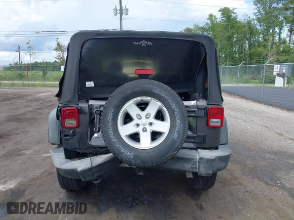 2016 Jeep Wrangler Black Bear with VIN 1C4AJWAGXGL258874, listed as a IAAI auction lot 42497153 with 93,294 mi miles and . Bid and sale history available at DreamBid. Image 16.