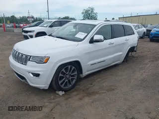 2017 Jeep Grand Cherokee Overland with VIN 1C4RJFCG6HC941771, listed as a IAAI auction lot 42356577 with 192,318 mi miles and . Bid and sale history available at DreamBid. Image 18.
