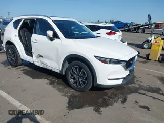 2017 Mazda CX-5 Grand Touring with VIN JM3KFADLXH0222341, listed as a IAAI auction lot 41990464 with 94,374 mi miles and . Bid and sale history available at carsss.com. Image 1.