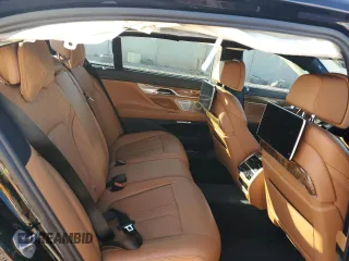 2018 BMW 7 Series 750i with VIN WBA7F0C57JGM23040, listed as a Copart auction lot 87392704 with 0 mi miles and Salvage Title. Bid and sale history available at carsss.com. Image 10.