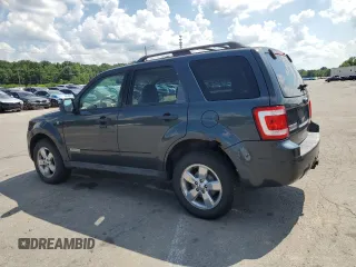 2008 Ford Escape XLT with VIN 1FMCU03178KA55787, listed as a Copart auction lot 64784465 with 2,235,503 mi miles and Clean title. Bid and sale history available at DreamBid. Image 2.