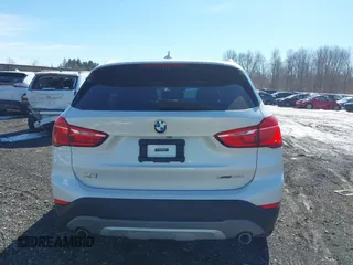 2019 BMW X1 xDrive28i with VIN WBXHT3C58K5N05523, listed as a IAAI auction lot 41752675 with 63,861 mi miles. Bid and sale history available at carsss.com. Image 16.