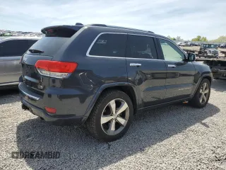 2016 Jeep Grand Cherokee Overland with VIN 1C4RJFCG9GC338165, listed as a Copart auction lot 54125815 with 102,302 mi miles and Salvage title. Bid and sale history available at DreamBid. Image 3.