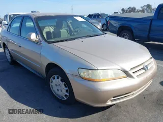 2002 Honda Accord LX z VIN 3HGCG56442G701480, wystawiony jako IAAI lot #41696487 z przebiegiem 131 309 mil mil oraz . Historia ofert i sprzedaży dostępna na DreamBid. Obrazek 1.