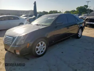 2007 Cadillac CTS z VIN 1G6DM57T970103000, wystawiony jako Copart lot #61390985 z przebiegiem 262 753 mil mil oraz Szkoda całkowita • Salvage title. Historia ofert i sprzedaży dostępna na DreamBid. Obrazek 1.