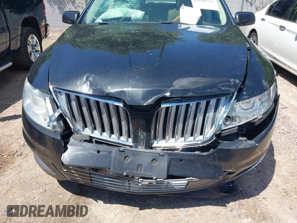 2011 Lincoln MKS EcoBoost with VIN 1LNHL9FT8BG607074, listed as a IAAI auction lot 42640791 with 187,795 mi miles and . Bid and sale history available at DreamBid. Image 6.