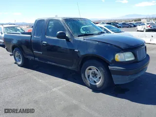 1999 Ford F-150 Work Series with VIN 1FTRX17W5XKB46900, listed as a IAAI auction lot 41792177 with 1 mi miles. Bid and sale history available at carsss.com. Image 1.