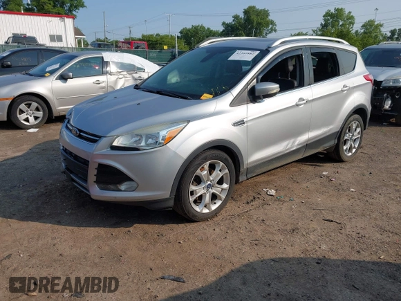 2015 Ford Escape Titanium z VIN 1FMCU0J90FUC02039, wystawiony jako IAAI lot #42369882 z przebiegiem 156 287 mil mil oraz . Historia ofert i sprzedaży dostępna na DreamBid. Obrazek 2.