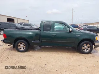 2001 Ford F-150 XL with VIN 1FTZX07271KB88709, listed as a IAAI auction lot 42599181 with 153,985 mi miles and . Bid and sale history available at DreamBid. Image 13.