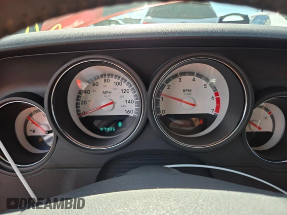 2009 Dodge Challenger R/T z VIN 2B3LJ54T69H588556, wystawiony jako Copart lot #56277855 z przebiegiem 47 405 mil mil oraz Szkoda całkowita • Salvage title. Historia ofert i sprzedaży dostępna na DreamBid. Obrazek 9.