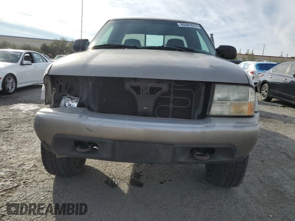 1999 GMC Sonoma SLS w/1SJ Pkg with VIN 1GTCT19W2X8516874, listed as a Copart auction lot 85501674 with 158,205 mi miles and Salvage Title. Bid and sale history available at carsss.com. Image 5.