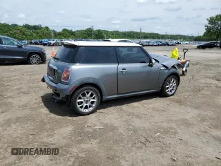2007 MINI Hardtop S with VIN WMWMF73577TT84087, listed as a Copart auction lot 60208895 with 76,248 mi miles and Salvage title. Bid and sale history available at DreamBid. Image 3.