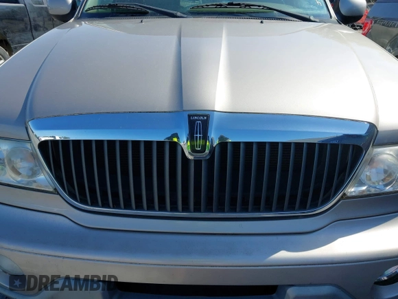2002 Lincoln Navigator z VIN 5LMFU28R12LJ03421, wystawiony jako IAAI lot #41977604 z przebiegiem 192 807 mil mil oraz . Historia ofert i sprzedaży dostępna na DreamBid. Obrazek 10.