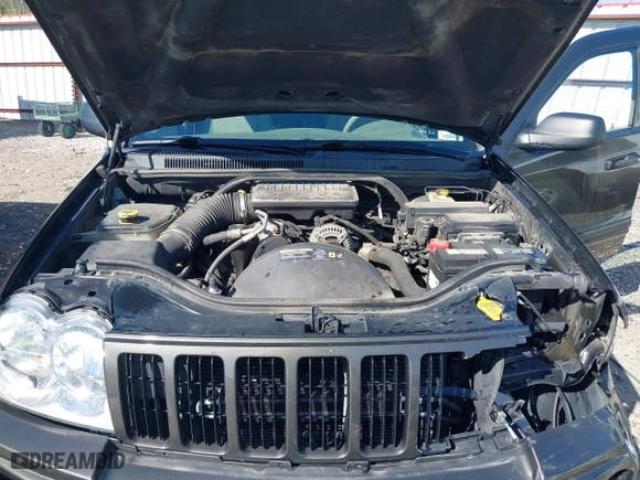 2006 Jeep Grand Cherokee Laredo with VIN 1J4GR48K56C326847, listed as a IAAI auction lot 41972623 with 141,088 mi miles. Bid and sale history available at carsss.com. Image 10.