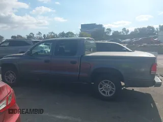 2003 Dodge Dakota SLT with VIN 1D7HL48N23S247441, listed as a IAAI auction lot 41359296 with 58,414 mi miles. Bid and sale history available at carsss.com. Image 14.