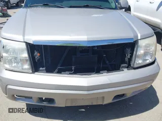 2005 Cadillac Escalade z VIN 1GYEC63N65R249827, wystawiony jako IAAI lot #42247650 z przebiegiem 254 052 mil mil oraz . Historia ofert i sprzedaży dostępna na DreamBid. Obrazek 18.