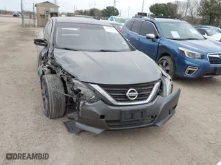 2018 Nissan Altima 2.5 SV with VIN 1N4AL3AP9JC256152, listed as a IAAI auction lot 41359670 with 136,686 mi miles. Bid and sale history available at carsss.com. Image 13.