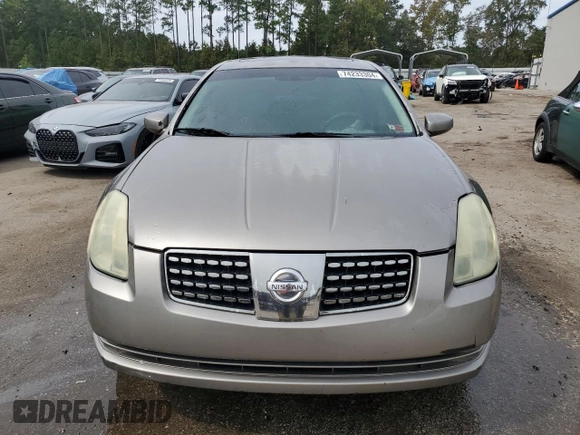 2004 Nissan Maxima SE with VIN 1N4BA41E34C888731, listed as a Copart auction lot 74233304 with 197,764 mi miles and Salvage Title. Bid and sale history available at carsss.com. Image 5.