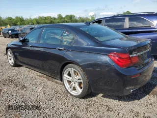 2014 BMW 7 Series 740Li xDrive z VIN WBAYF4C58ED281817, wystawiony jako Copart lot #55755815 z przebiegiem 112 398 mil mil oraz Szkoda całkowita • Salvage title. Historia ofert i sprzedaży dostępna na DreamBid. Obrazek 2.