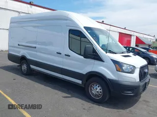 2023 Ford Transit Cargo z VIN 1FTBR3U86PKA69175, wystawiony jako IAAI lot #42520049 z przebiegiem 50 866 mil mil oraz . Historia ofert i sprzedaży dostępna na DreamBid. Obrazek 1.