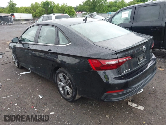 2023 Volkswagen Jetta SE with VIN 3VW7M7BUXPM038075, listed as a IAAI auction lot 42314234 with 19,490 mi miles and . Bid and sale history available at DreamBid. Image 3.