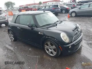 2006 MINI Convertible S with VIN WMWRH33516TF86823, listed as a IAAI auction lot 42184059 with Not Provided miles and . Bid and sale history available at DreamBid. Image 1.