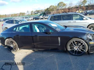 2023 Porsche Panamera with VIN WP0AJ2A77PL100226, listed as a IAAI auction lot 41554538 with 52,257 mi miles and . Bid and sale history available at DreamBid. Image 13.