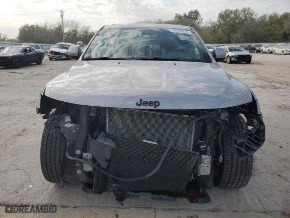 2021 Jeep Grand Cherokee Laredo X with VIN 1C4RJEAG0MC680564, listed as a Copart auction lot 75629034 with 75,072 mi miles and Salvage Title. Bid and sale history available at carsss.com. Image 5.