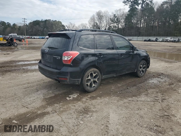 2014 Subaru Forester XT Touring with VIN JF2SJGMC2EH534565, listed as a Copart auction lot 44773305 with 142,537 mi miles and Salvage Title. Bid and sale history available at DreamBid. Image 3.