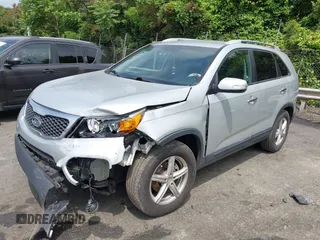 2013 Kia Sorento LX with VIN 5XYKT4A20DG360991, listed as a IAAI auction lot 42258999 with 129,278 mi miles and . Bid and sale history available at DreamBid. Image 2.