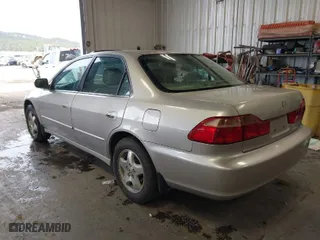 1999 Honda Accord Sdn EX with VIN 1HGCG1656XA058833, listed as a IAAI auction lot 41821064 with 107,160 mi miles. Bid and sale history available at carsss.com. Image 3.