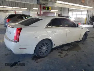 2012 Cadillac CTS Premium with VIN 1G6DS5E39C0150157, listed as a Copart auction lot 87795735 with 127,225 mi miles and Salvage Title. Bid and sale history available at DreamBid. Image 3.