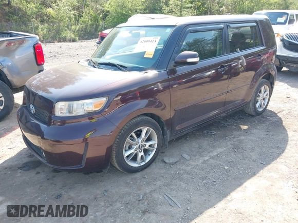 2010 Scion xB with VIN JTLZE4FE7A1101670, listed as a IAAI auction lot 42009413 with 165,418 mi miles. Bid and sale history available at carsss.com. Image 2.