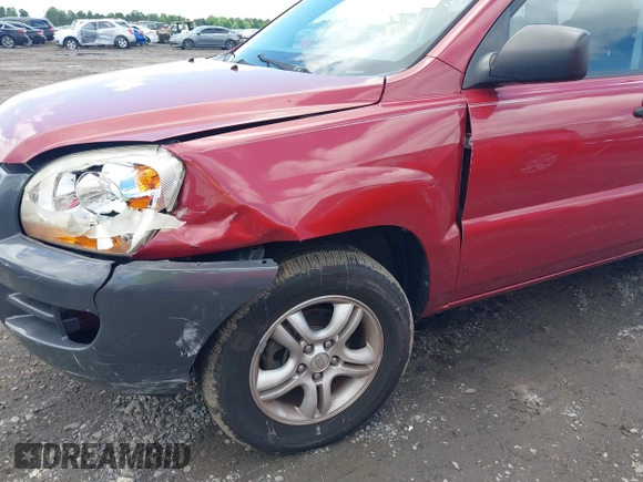 2006 Kia Sportage LX with VIN KNDJF723567236257, listed as a IAAI auction lot 42241914 with 185,503 mi miles and . Bid and sale history available at DreamBid. Image 12.