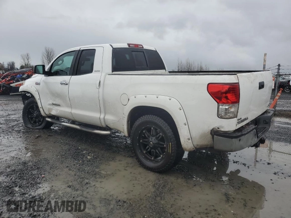 2011 Toyota Tundra 4WD Truck LTD with VIN 5TFBY5F12BX163659, listed as a Copart auction lot 87065074 with 262,150 mi miles and Salvage Title. Bid and sale history available at carsss.com. Image 2.