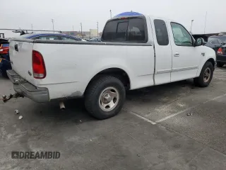 2000 Ford F-150 XL with VIN 1FTRX17L5YKA74815, listed as a Copart auction lot 85821444 with 0 mi miles and Salvage Title. Bid and sale history available at carsss.com. Image 3.