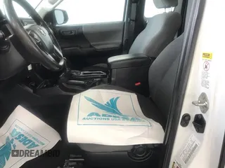 2017 Toyota Tacoma SR z VIN 5TFRX5GN4HX081282, wystawiony jako IAAI lot #42434418 z przebiegiem 184 905 mil mil oraz . Historia ofert i sprzedaży dostępna na DreamBid. Obrazek 22.