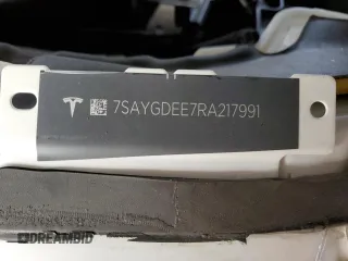 2024 Tesla Model Y Long Range z VIN 7SAYGDEE7RA217991, wystawiony jako Copart lot #50885695 z przebiegiem Nie podano mil oraz Szkoda całkowita • Salvage title. Historia ofert i sprzedaży dostępna na DreamBid. Obrazek 16.