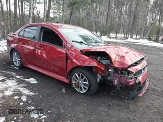 2016 Mitsubishi Lancer SE with VIN JA32V2FW7GU004159, listed as a IAAI auction lot 41401386 with 100,536 mi miles. Bid and sale history available at carsss.com. Image 1.