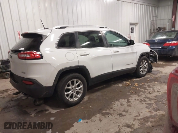 2016 Jeep Cherokee Latitude with VIN 1C4PJMCB1GW119621, listed as a IAAI auction lot 41310872 with 123,841 mi miles. Bid and sale history available at carsss.com. Image 4.