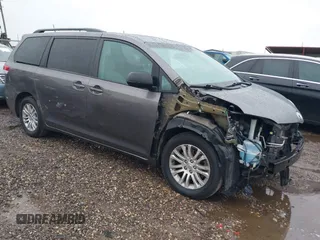 2014 Toyota Sienna XLE with VIN 5TDYK3DC0ES502482, listed as a IAAI auction lot 41910683 with 151,330 mi miles. Bid and sale history available at carsss.com. Image 1.