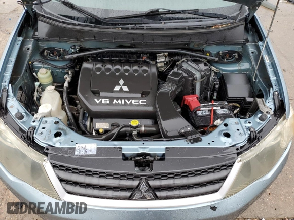 2007 Mitsubishi Outlander LS z VIN JA4MT31XX7Z016180, wystawiony jako Copart lot #59299615 z przebiegiem 125 060 mil mil oraz Szkoda całkowita • Salvage title. Historia ofert i sprzedaży dostępna na DreamBid. Obrazek 12.