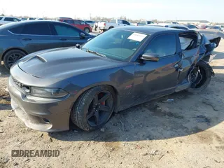 2021 Dodge Charger Scat Pack with VIN 2C3CDXGJ9MH511348, listed as a IAAI auction lot 41688349 with 56,425 mi miles and . Bid and sale history available at DreamBid. Image 18.