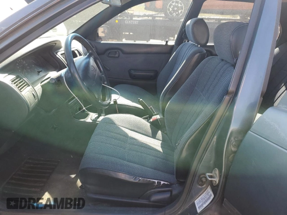 1994 Toyota Corolla with VIN 1NXAE04B7RZ129212, listed as a Copart auction lot 56760095 with 156,822 mi miles and Non repairable. Bid and sale history available at DreamBid. Image 7.