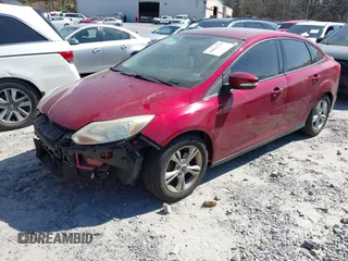 2014 Ford Focus SE with VIN 1FADP3F28EL179150, listed as a IAAI auction lot 41821710 with 147,756 mi miles and . Bid and sale history available at DreamBid. Image 2.
